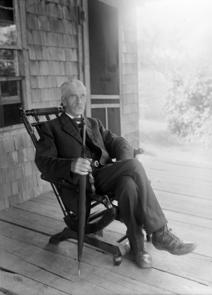 Jones Ben seated glass neg.jpg