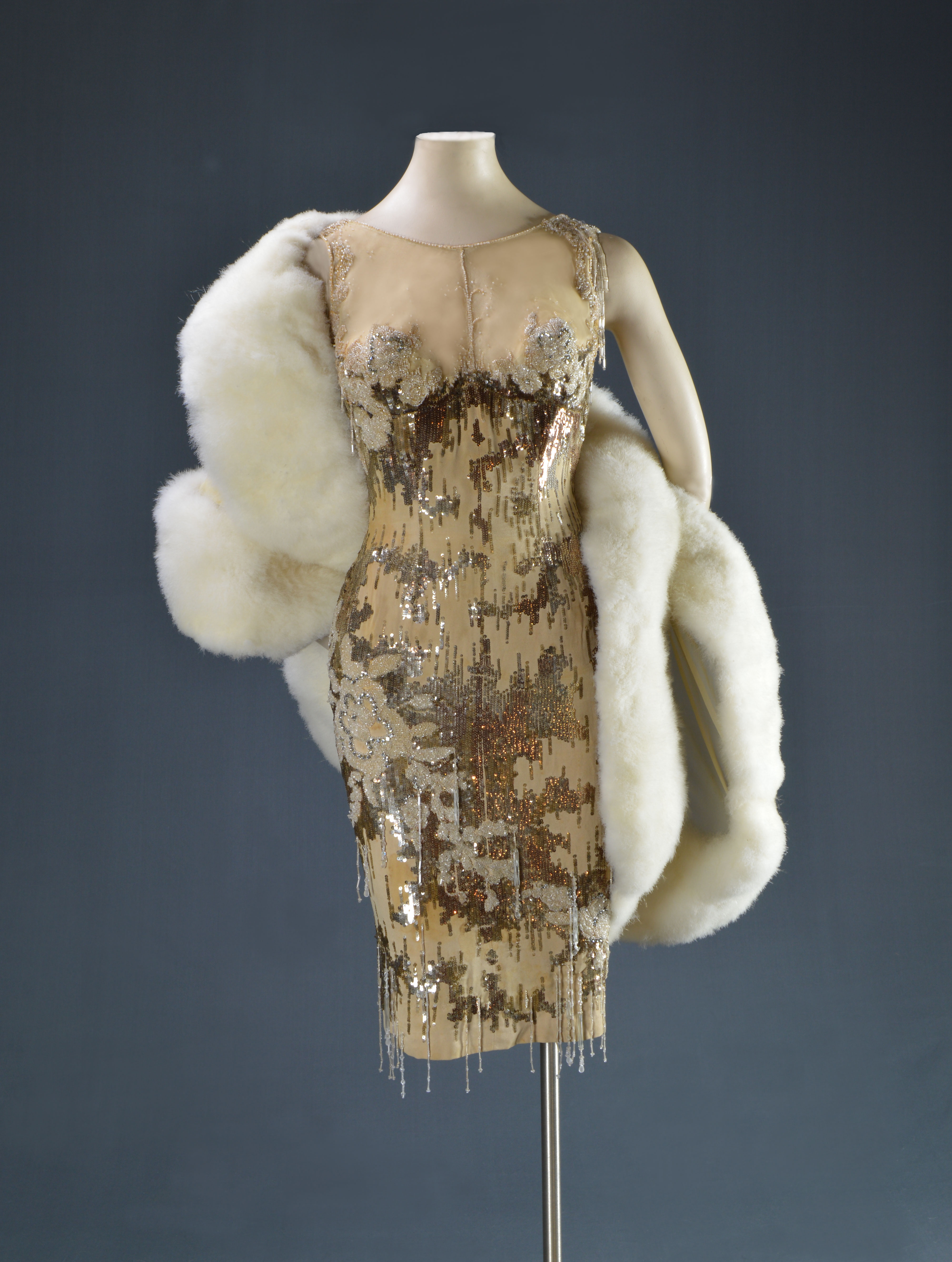 who designed marilyn monroe's dress in some like it hot Marilyn Monroe on the set of Some Like It Hot (1958) The Peek-A-Boo Souffl Dress by Orry-Kelly for Some Like It Hot #costumedesign #marilynmonroe #1950sfashion #somelikeithot #cinema