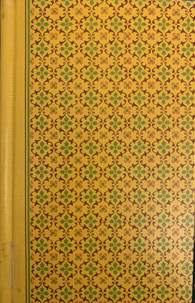 This book is titled "Savage Heart: A Novel" by Denton Whitson. The book cover is yellow with green and pink flowers.