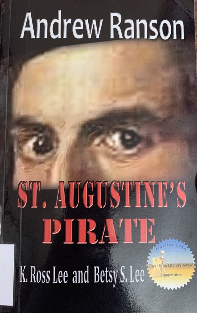 This book is titled "Andrew Ranson, St. Augustine's Pirate: A Historical Novel of 17th Century Intrigue" by K. Ross Lee and Betsy S. Lee. The book has a black cover and an image of a man's eyes, cut off at his hairline and under his nose.