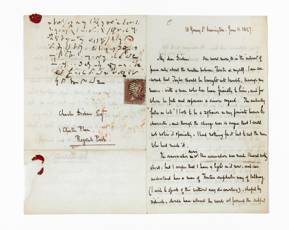 On the right-hand half of a folded sheet of paper is a letter neatly written in black ink on white paper, thin enough to see the words written overleaf. The joined up handwriting is neatly spaced in straight lines and easily decipherable. On the left-hand side, eight lines of Brachygraphy shorthand annotation are written about the stamp and address. Parts of the wax seal remain on the top left corner and bottom left edge.